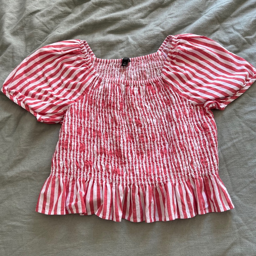 Salmon and white stripped peplum shirred top